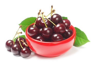 Cherries in red bowl