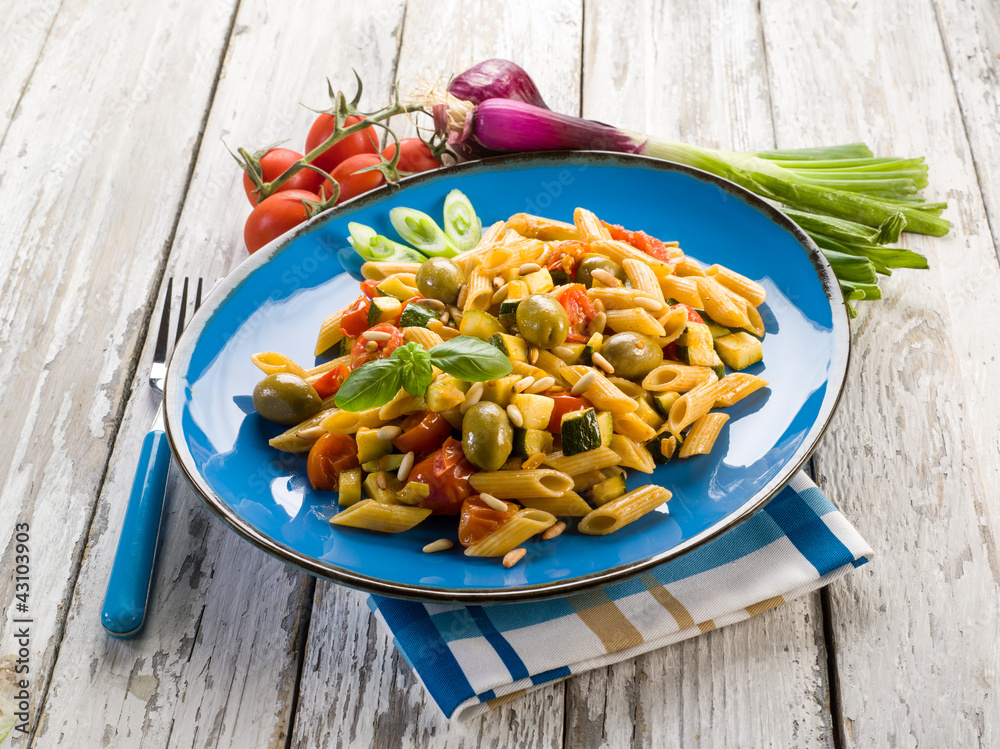 Canvas Prints cold pasta salad with pachino olives zucchins and pine kernel