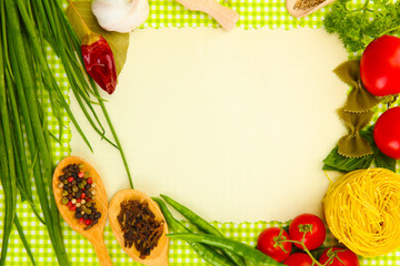 paper for recipes,vegetables and spices on green background