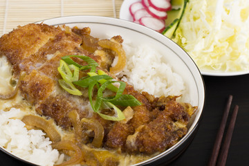 Katsudon - Beaded fried pork cutlet, onion & egg on rice.