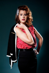 Fototapeta premium Pretty young retro looking feamle with red hair