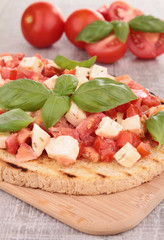 bruschetta with tomato, mozzarella and basil