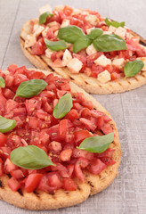 bruschetta with tomato, mozzarella and basil