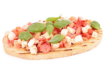 bruschetta with tomato, mozzarellla and basil