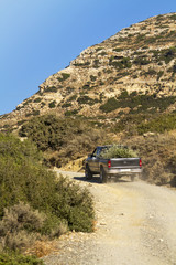 Pick up truck in the dry hills of crete