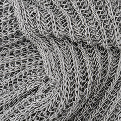 close up grey knitted pullover background