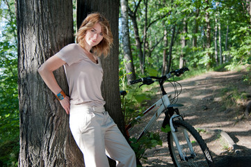 Naklejka na ściany i meble Girl with a bicycle