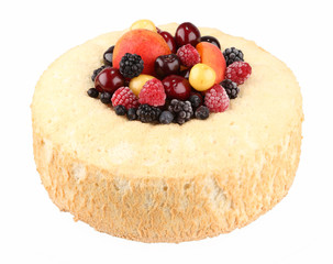 isolated ring cake filled with fruits on white background