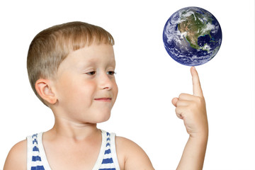 Boy turns the globe on finger