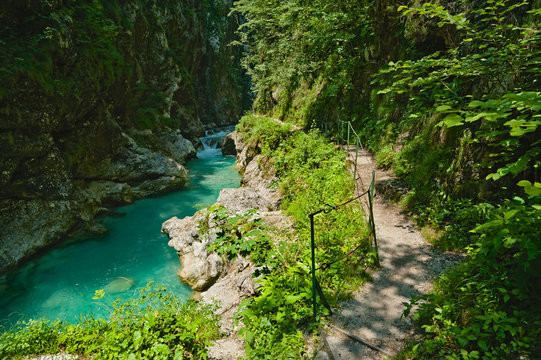 Mountain river and a trail. Tolmin gorges, Slovenia.