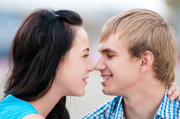 Fototapeta premium Portrait of a beautiful young happy smiling couple