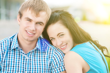 Fototapeta premium Portrait of a beautiful young happy smiling couple