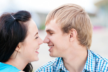 Portrait of a beautiful young happy smiling couple