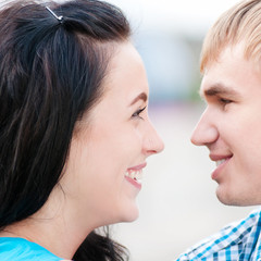 Portrait of a beautiful young happy smiling couple