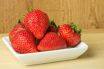Plate of fresh strawberries
