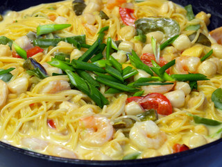 Fresh Pasta and Seafood in a Cream Sauce with Green Onions