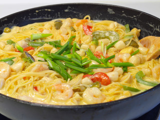 Fresh Pasta and Seafood in a Cream Sauce with Green Onions