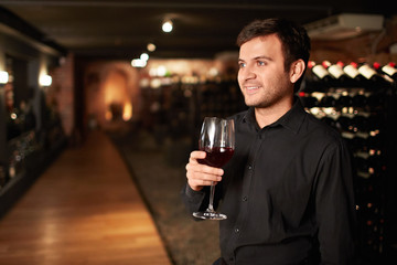 Man with a glass of wine