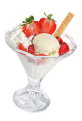 Vanilla ice cream with strawberries and whipped cream