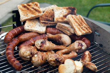 barbecue with delicious grilled meat on grill