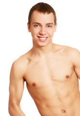 Fototapeta premium Strong man with a helathy body isolated over white