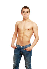 Fototapeta premium Strong man with a helathy body isolated over white