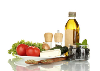 Ingredients for a Greek salad isolated on white background
