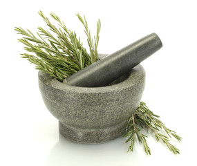 mortar with fresh green  rosemary isolated on white