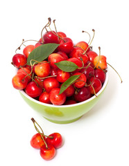yellow and red cherries in bowl
