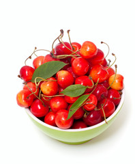 yellow and red cherries in bowl