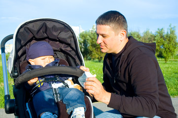 father and son in park