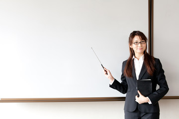 a young businesswoman teaching