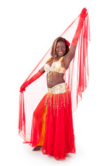 African-american belly dancer posing with veil
