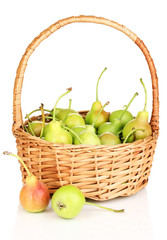 ripe pears in basket isolated on white.