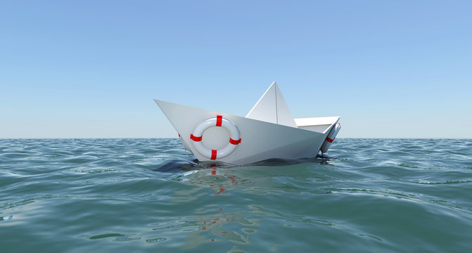 White paper boat floating in the sea water