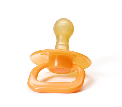 Chupete en fondo blanco,un chup&oacute;n de beb&eacute;.