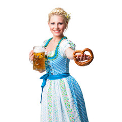 junge blonde Frau im Dirndl mit Masskrug und Brezn