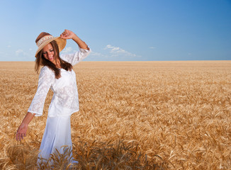 Girl on wheat field