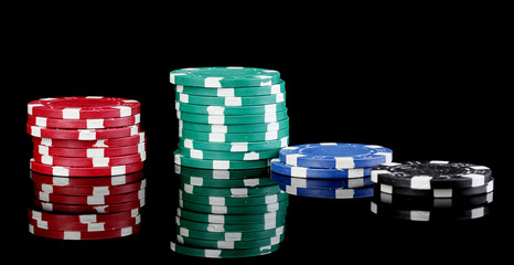 Casino chips isolated on black