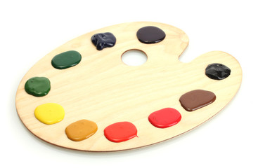 wooden art palette with paint isolated on white