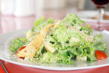 Try a caesar salad! Detail of a classic chicken caesar salad wit