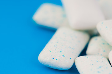 Chewing gums on blue