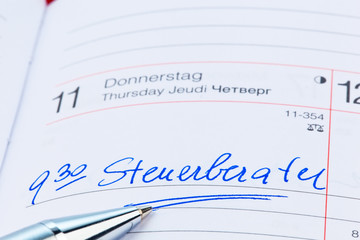 Obraz premium Eintrag im Kalender: Steuerberater