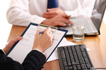 Businesspeople sitting at a table