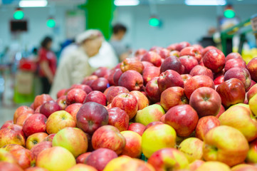 bunch of fresh red apples in supermarket