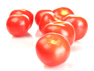 Ripe red tomatoes isolated on white