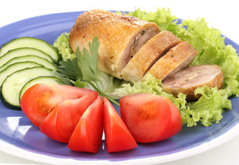 Tasty meat cutlet with garnish on plate close-up