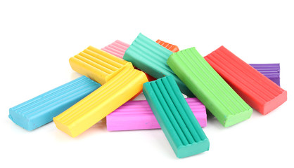 Children bright plasticine isolated on white