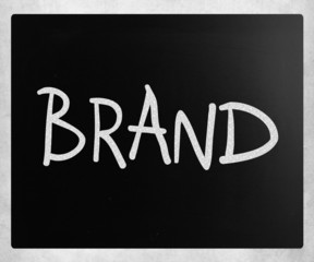 "Brand" handwritten with white chalk on a blackboard