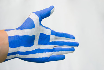 Hand bemalt mit griechischer Flagge - obrazy, fototapety, plakaty